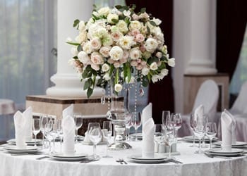 Perfectly Beautiful Formal Wedding Reception Formal wedding reception complete with floral arrangement and folded napkins
