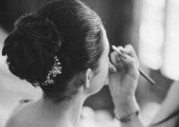 brides hairstyling in structured bun 