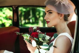 Bride in wedding car
